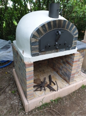 Adoptez le four à pizza dans votre jardin grâce à ces 9 inspirations  Four  a bois exterieur, Motif de cuisine en plein air, Barbecue exterieur en  pierre